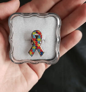 INSIGNIA CONSCIENTIZAÇÃO SOBRE AUTISMO